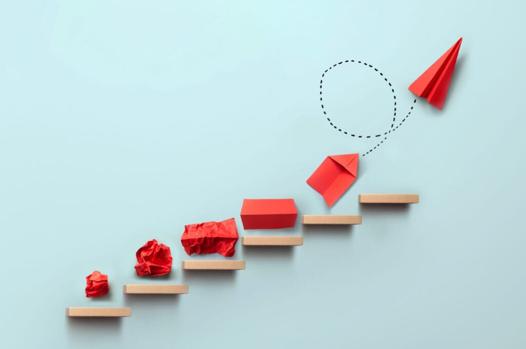 paper airplane business transformation metaphor